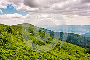 Green grassy slope of Runa mountain ridge