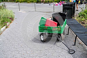 Green groundskeeper grounds keeper garden wagon with tools urban park