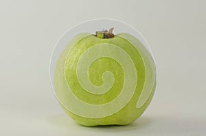 Green guava fruit on white background. Fruits that are high in vitamin C