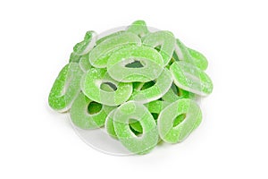 Green gummy candies rings isolated on white. Top view. Jelly  sweets