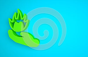 Green Hand holding a fire icon isolated on blue background. Minimalism concept. 3D render illustration