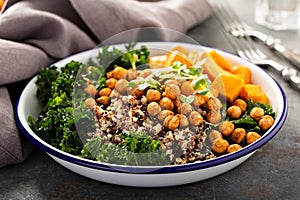 Green and healthy grain bowl with roasted chickpeas