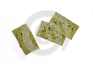 Green Healthy snack: cereal crunchy multigrain cereal flax seed pumpkin isolated.