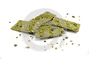 Green Healthy snack: cereal crunchy multigrain cereal flax seed pumpkin isolated.