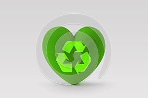 Green heart with recycling symbol on white background - Concept of ecology