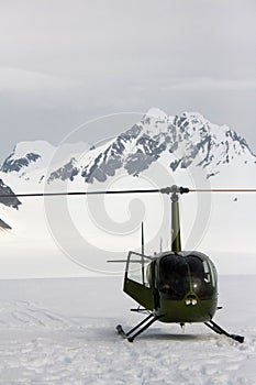 Green Helicopter on Glacier Alaska
