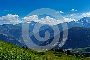 Green high altitude Alps pasture