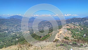 Green hill view with blue sky in Letefoho, Timor-Leste. photo