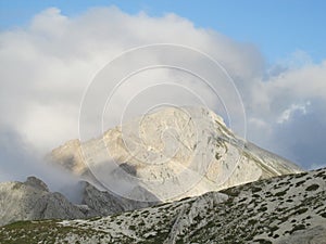 Green hills of Apennine Mountain Range in clouds