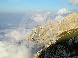 Green hills of Apennine Mountain Range in clouds