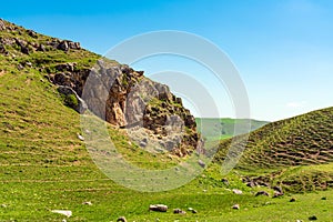 Green hills and cliffs in spring