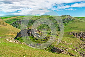 Green hills and cliffs in spring