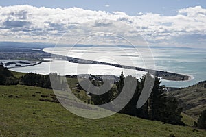 Green hills and coastline with turquoise sea, New Zealand