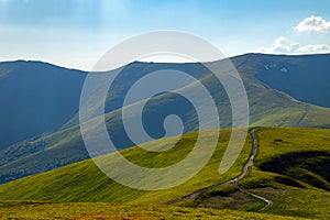 Green Hills of Forestless Mountains at Summer Time