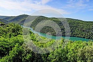 Green Hills and Jade Colored River in Istria Region of Croatia o