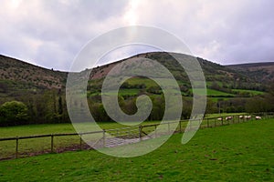 Green hills and a rural farm near Black Mountains, Brecon Beacons , Wales, UK