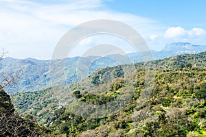 Green hills under blue sky in Sicily