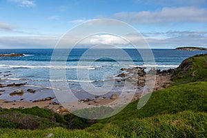 The green hillsides at the Rosetta Bluff and Petrel Cove beach located on the Fleurieu Peninsula Victor Harbor South Australia on