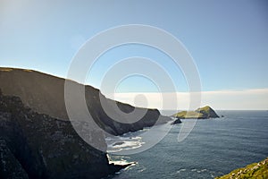 Green hilly coast and island in Ireland on the Atlantic coast.Kerry Cliffs Portmagee.Ring Of Kerry. Ireland