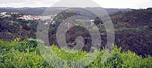 Green hilly landscape with hilltop medieval castle, near Belver, Portugal