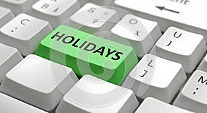 Green holidays key on a computer keyboard