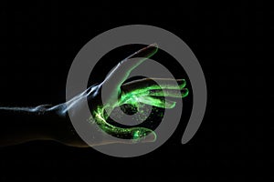 Green hologram of hand on black background. Generate ai