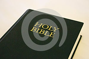 Green Holy Bible on white background. Religion and faith concept. Religious literature. Green Bible isolated.