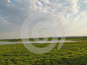 green horizon and beautiful sky photo