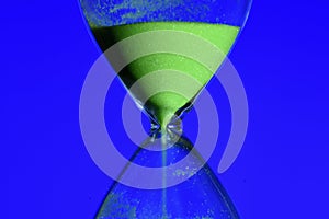 green hourglass, counting the time photo