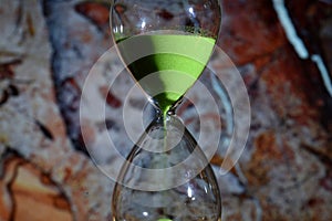 green hourglass, counting the time photo