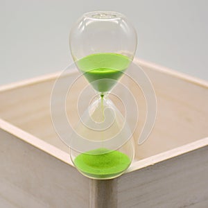 Green hourglass, counting time