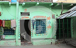 A green house of concrete in small town in India