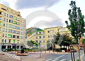 Clean city. Light-green buildings in Grenoble, France photo