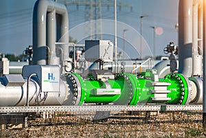 Green Hydrogen renewable energy production pipeline - green hydrogen gas for clean electricity solar and windturbine facility