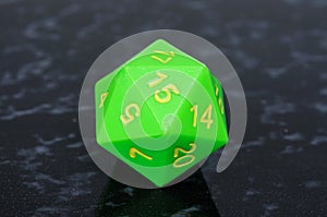 Green icosahedron 20 sided dice.