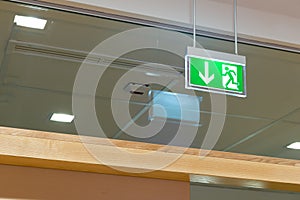 Green illuminated exit sign