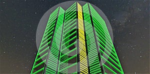 Green illumination of the awesome office building. Yellow glowing inserts. Bottom view against the starry sky. 3d rendering