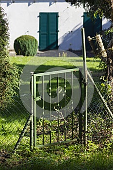 green iron garden gate door rural style