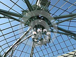 Green iron roof with ceiling lamp