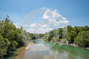 Green Isar river, with trees at the riverside, near Arzbach Lenggries, upper bavaria