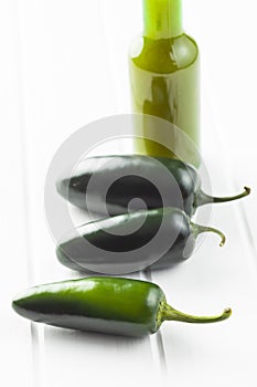 Green jalapeno peppers and tabasco sauce