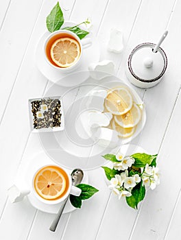 Green jasmine tea ceremony with marshmallow, topview