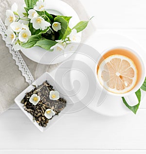 Green jasmine tea, jasmine petals, topview