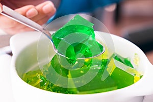 Green Jelly on a Spoon