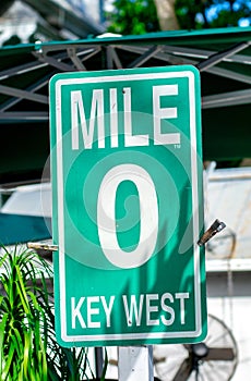 Green key west sign outdoors