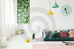 Green kid`s room with clock