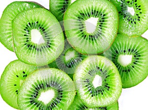 Green kiwi slices isolated on white as background