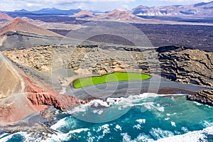 Green lake aerial view Charco de Los Clicos Verde near El Golfo on Lanzarote island on Canary Islands in Spain