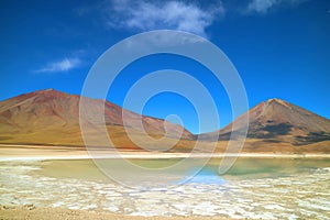 Green Lake or Laguna Verde Becoming Green Color by the Wind with Lincancabur Volcano in the backdrop, Bolivia, South America photo