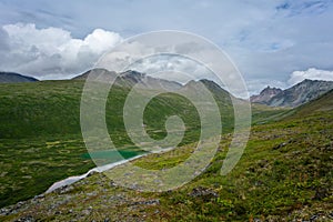 Green lake in old glacier near Denali